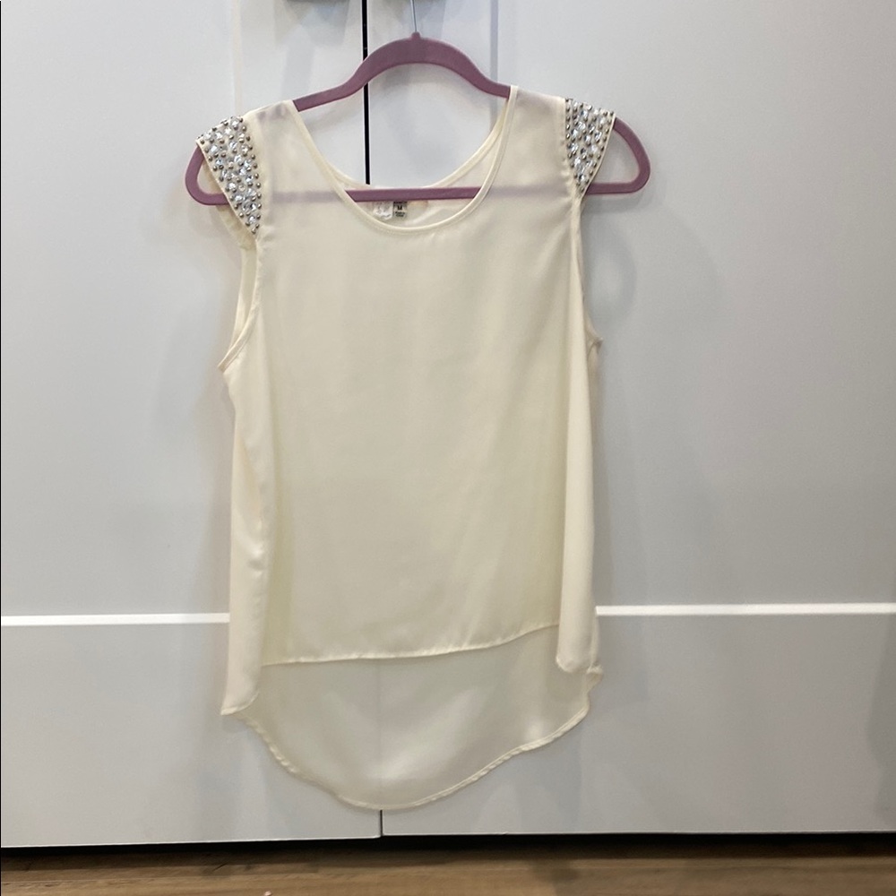 Asymmetrical Cream Sleeveless Blouse